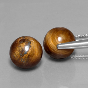 Achetez naturel ct Or Brun Oeil de Tigre gems, Sphère / Boule, En provenance Thaïlande chez GemSelect. En stock, livraison internationale!