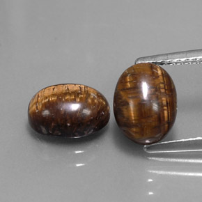 Achetez naturel ct marron tiger's eye gems, coupe ovale, en provenance thaïlande chez gemselect. en stock, livraison internationale!