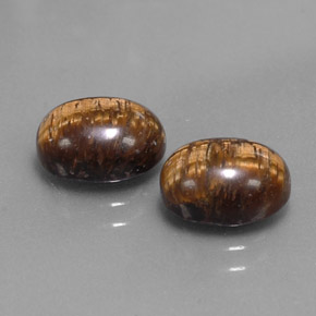 Achetez naturel ct marron tiger's eye gems, coupe ovale, en provenance thaïlande chez gemselect. en stock, livraison internationale!