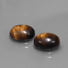 Achetez naturel ct marron tiger's eye gems, coupe ovale, en provenance thaïlande chez gemselect. en stock, livraison internationale!