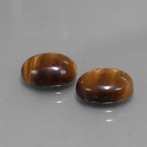 Achetez naturel ct marron tiger's eye gems, coupe ovale, en provenance thaïlande chez gemselect. en stock, livraison internationale!