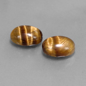 Achetez naturel ct marron tiger's eye gems, coupe ovale, en provenance thaïlande chez gemselect. en stock, livraison internationale!