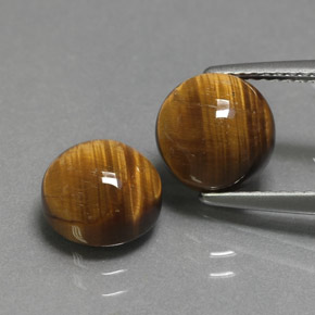 Achetez naturel ct marron tiger's eye gems, coupe roude, en provenance thaïlande chez gemselect. en stock, livraison internationale!