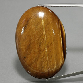 Tiger's eye marron naturelle coupe ovale, 68,47 ct, opaque