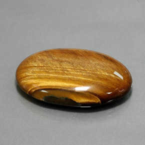 Tiger's eye marron naturelle coupe ovale, 68,47 ct, opaque