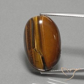 27.02ct Naturel Brun doré Oeil de Tigre, ovale, Opaque