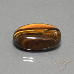 Œil de tigre Brun doré naturelle ovale, 27.02 ct, Opaque