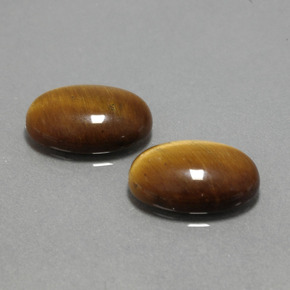 Achetez naturel ct marron tiger's eye gems, coupe ovale, en provenance thaïlande chez gemselect. en stock, livraison internationale!