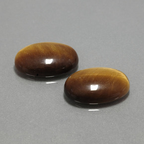 Achetez naturel ct marron tiger's eye gems, coupe ovale, en provenance thaïlande chez gemselect. en stock, livraison internationale!