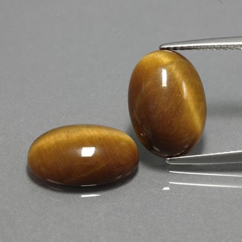 Achetez naturel 9,04ct marron tiger's eye gems, coupe ovale, en provenance thaïlande chez gemselect. en stock, livraison internationale!