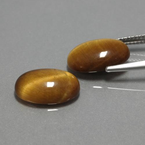 Achetez naturel 9,04ct marron tiger's eye gems, coupe ovale, en provenance thaïlande chez gemselect. en stock, livraison internationale!