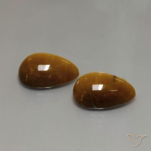 Shop natural 22.63ct Brun doré Œil de tigre gems, En forme de poire, from Thaïlande at GemSelect. In stock, global shipping!