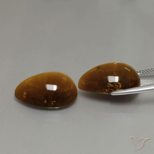 Shop natural 22.63ct Brun doré Œil de tigre gems, En forme de poire, from Thaïlande at GemSelect. In stock, global shipping!