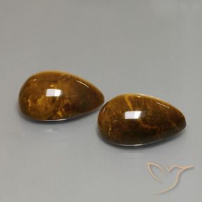 Shop natural 22.82ct Marron chaud Œil de tigre gems, En forme de poire, from Thaïlande at GemSelect. In stock, global shipping!
