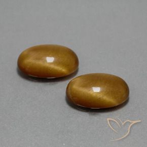 Shop natural 9.05ct Brun doré Œil de tigre gems, ovale, from Thaïlande at GemSelect. In stock, global shipping!