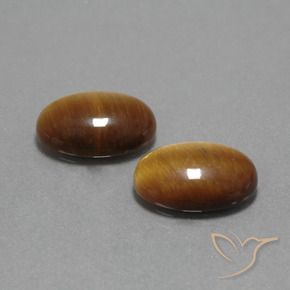 Shop natural 9.08ct Brun moyen-léger Œil de tigre gems, ovale, from Thaïlande at GemSelect. In stock, global shipping!