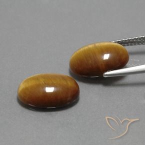 Shop natural 9.08ct Brun moyen-léger Œil de tigre gems, ovale, from Thaïlande at GemSelect. In stock, global shipping!