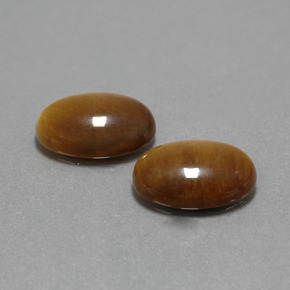 Achetez naturel 8.98ct Marron chaud Oeil de Tigre gems, Coupe ovale, En provenance Thaïlande chez GemSelect. En stock, livraison internationale!
