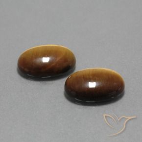 Shop natural 9.06ct Brun doré Œil de tigre gems, ovale, from Thaïlande at GemSelect. In stock, global shipping!