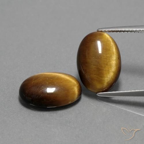 Achetez naturel 9.00ct Brun doré Oeil de Tigre gems, Coupe ovale, En provenance Thaïlande chez GemSelect. En stock, livraison internationale!