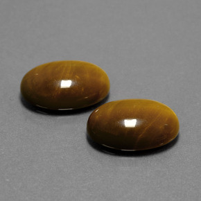 Achetez naturel ct marron tiger's eye gems, coupe ovale, en provenance thaïlande chez gemselect. en stock, livraison internationale!