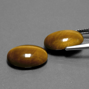 Achetez naturel ct marron tiger's eye gems, coupe ovale, en provenance thaïlande chez gemselect. en stock, livraison internationale!
