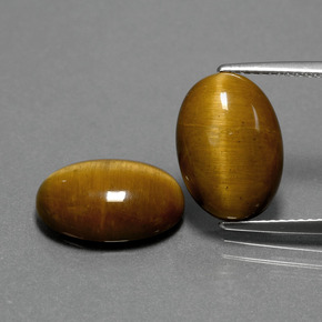 Achetez naturel ct marron tiger's eye gems, coupe ovale, en provenance thaïlande chez gemselect. en stock, livraison internationale!