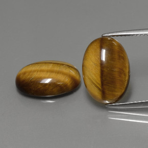 Achetez naturel ct marron tiger's eye gems, coupe ovale, en provenance thaïlande chez gemselect. en stock, livraison internationale!