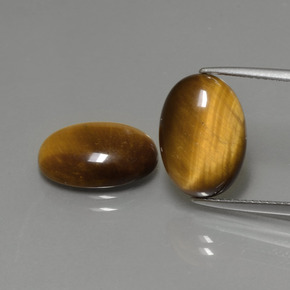 Achetez naturel ct marron tiger's eye gems, coupe ovale, en provenance thaïlande chez gemselect. en stock, livraison internationale!