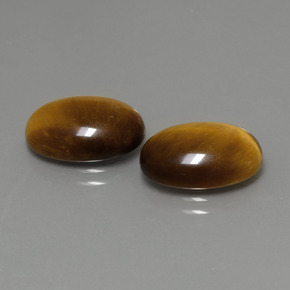 Achetez naturel ct marron tiger's eye gems, coupe ovale, en provenance thaïlande chez gemselect. en stock, livraison internationale!