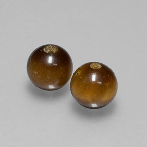 Achetez naturel ct marron tiger's eye gems, sphère / boule, en provenance thaïlande chez gemselect. en stock, livraison internationale!