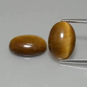 Achetez naturel 9,19ct marron tiger's eye gems, coupe ovale, en provenance thaïlande chez gemselect. en stock, livraison internationale!