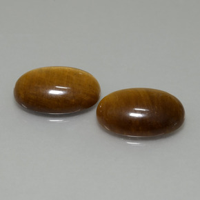 Achetez naturel 9,19ct marron tiger's eye gems, coupe ovale, en provenance thaïlande chez gemselect. en stock, livraison internationale!