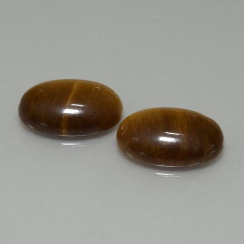 Achetez naturel 9.09ct Marron chaud Oeil de Tigre gems, Coupe ovale, En provenance Thaïlande chez GemSelect. En stock, livraison internationale!