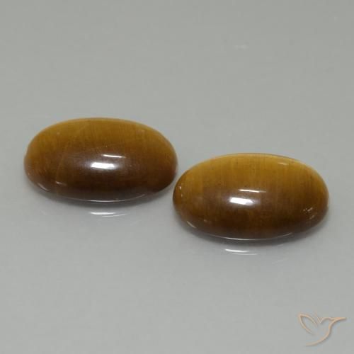 Shop natural 9.16ct Marron chaud Œil de tigre gems, ovale, from Thaïlande at GemSelect. In stock, global shipping!