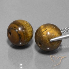 Shop natural 25.67ct Brun moyen Œil de tigre gems, Sphère / Boule, from Thaïlande at GemSelect. In stock, global shipping!