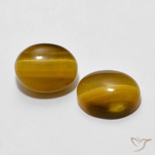 Shop natural 6.08ct Marron chaud Œil de tigre gems, ovale, from Thaïlande at GemSelect. In stock, global shipping!