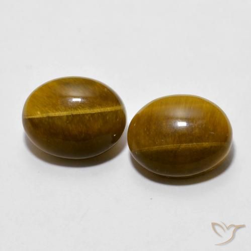 Shop natural 6.10ct Brun moyen Oeil de Tigre gems, ovale, from Thaïlande at GemSelect. In stock, global shipping!