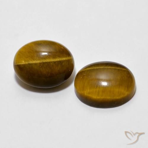 Shop natural 6.10ct Brun moyen Oeil de Tigre gems, ovale, from Thaïlande at GemSelect. In stock, global shipping!
