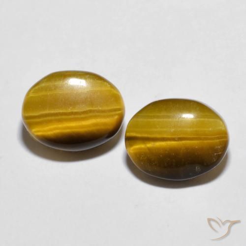 Shop natural 5.46ct Brun moyen Oeil de Tigre gems, ovale, from Thaïlande at GemSelect. In stock, global shipping!