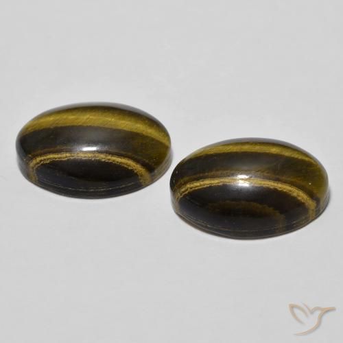 Shop natural 7.68ct Marron chaud Œil de tigre gems, ovale, from Thaïlande at GemSelect. In stock, global shipping!