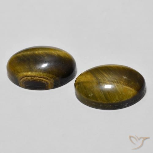 Shop natural 7.74ct Brun doré Œil de tigre gems, ovale, from Thaïlande at GemSelect. In stock, global shipping!