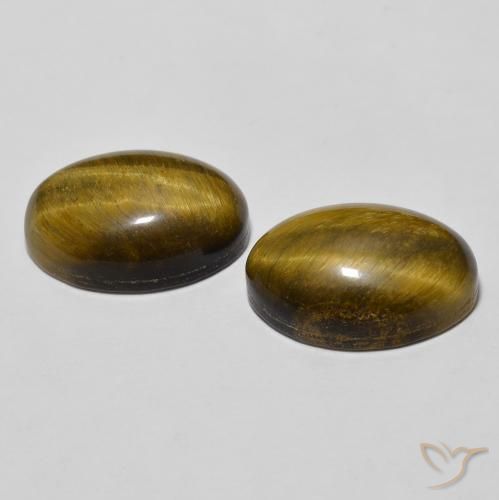 Shop natural 7.90ct Brun doré Œil de tigre gems, ovale, from Thaïlande at GemSelect. In stock, global shipping!