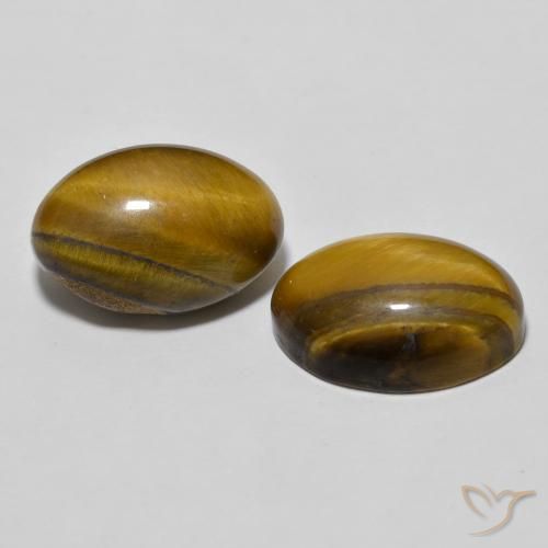 Shop natural 7.87ct Medium Dark-Brown Œil de tigre gems, ovale, from Thaïlande at GemSelect. In stock, global shipping!