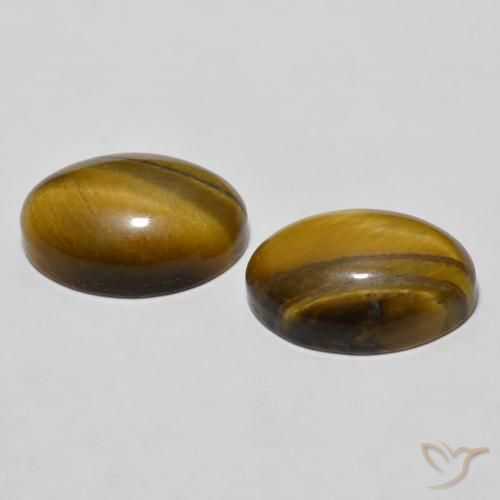 Shop natural 7.87ct Medium Dark-Brown Œil de tigre gems, ovale, from Thaïlande at GemSelect. In stock, global shipping!