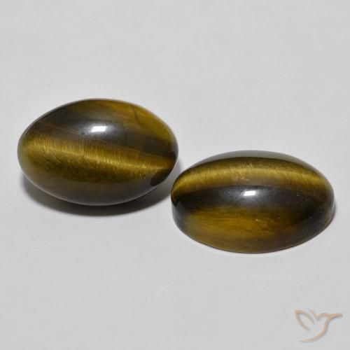 Shop natural 7.71ct Brun moyen Œil de tigre gems, ovale, from Thaïlande at GemSelect. In stock, global shipping!