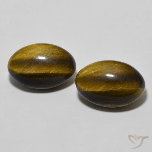 Shop natural 7.95ct Brun doré Oeil de Tigre gems, ovale, from Thaïlande at GemSelect. In stock, global shipping!
