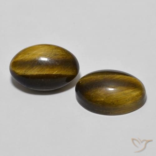 Shop natural 7.95ct Brun doré Oeil de Tigre gems, ovale, from Thaïlande at GemSelect. In stock, global shipping!