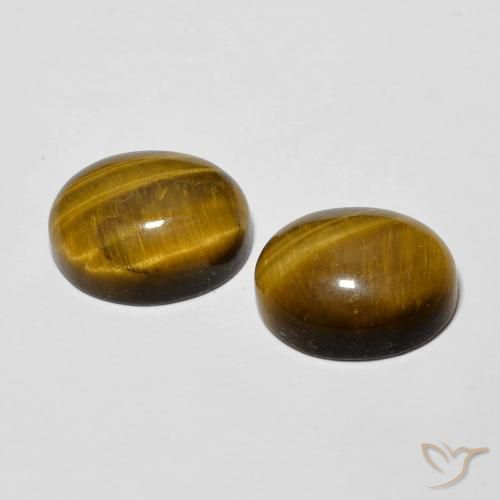Shop natural 6.01ct Brun doré Œil de tigre gems, ovale, from Thaïlande at GemSelect. In stock, global shipping!