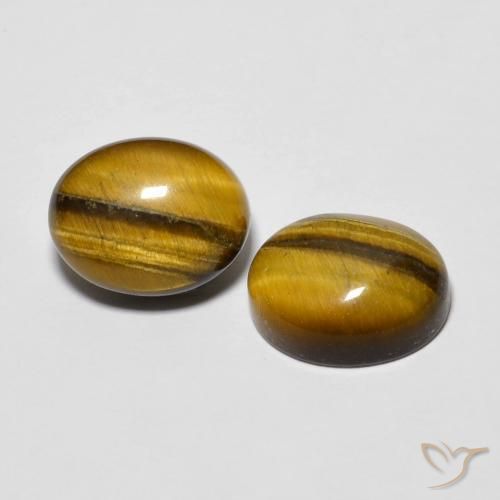 Shop natural 6.15ct Marron jaunâtre Œil de tigre gems, ovale, from Thaïlande at GemSelect. In stock, global shipping!